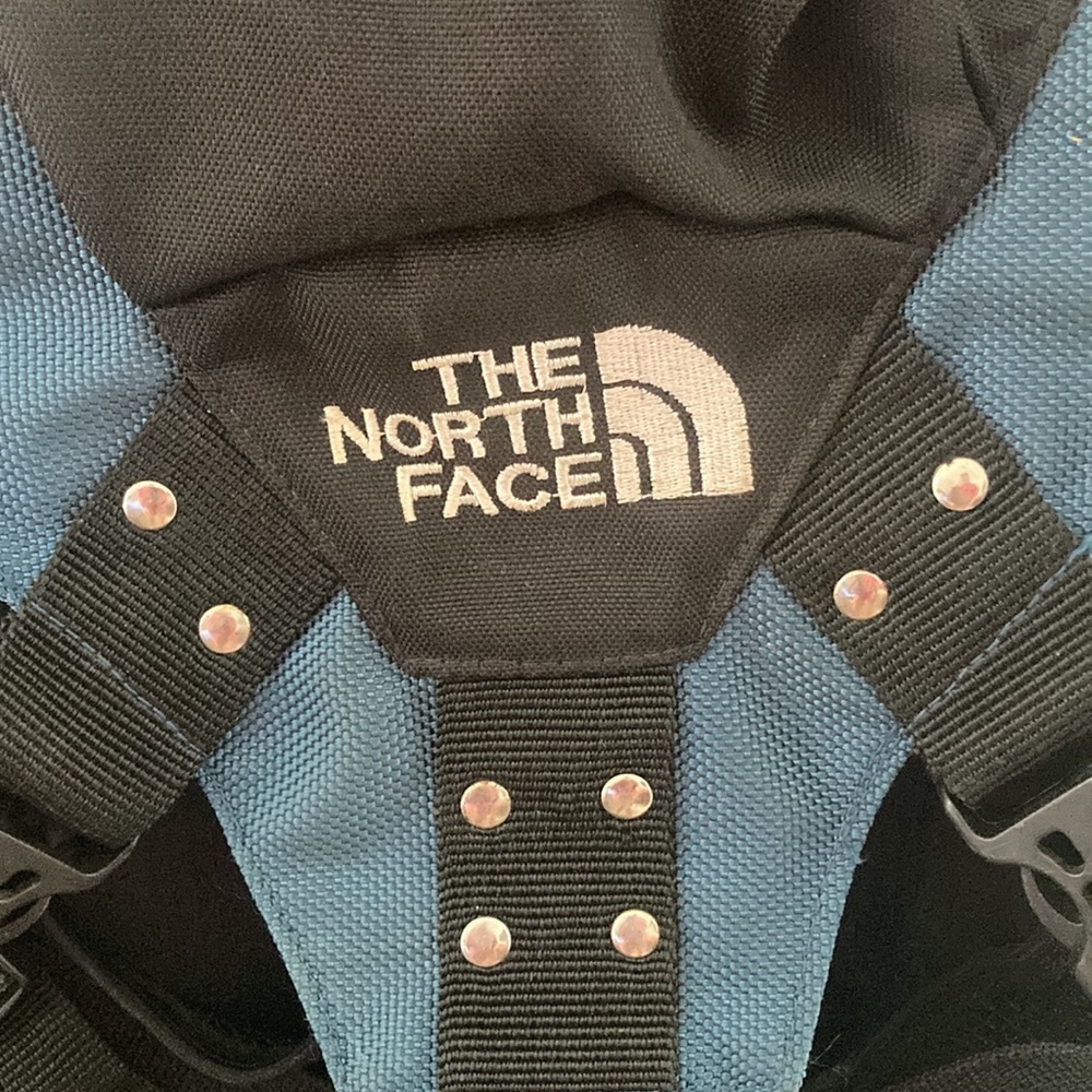 North Face blue and black backpack. Travel, school, camp, sports.